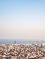 Foggy views of the city of Barcelona and the Mediterranean sea