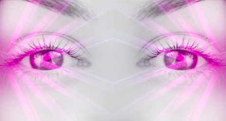 Eyes of   female on a bright abstract background with holograms