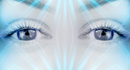 Eyes of   female on a bright abstract background with holograms