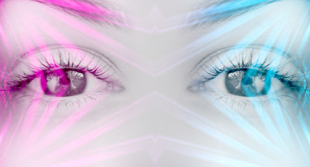 Eyes of   female on a bright abstract background with holograms