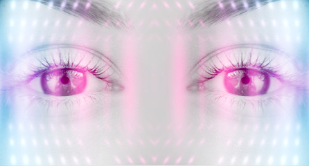 Eyes of   female on a bright abstract background with holograms