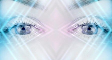 Eyes of   female on a bright abstract background with holograms