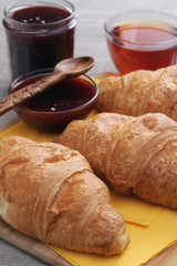 Croissants with marmalade and tea