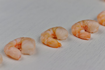 Shrimps on a white board