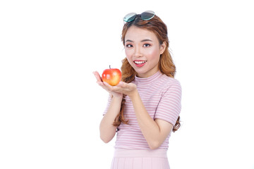 Asian young healthy beautiful attractive pretty girl with red apple on white background