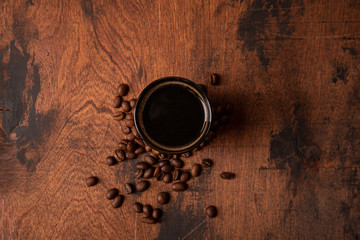 espresso coffee on wooden background. rustic style