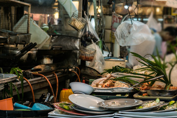 Dirty kitchen area. Inside the restaurants within the Chatuchak Weekend market.