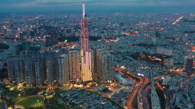 Aerial view of Downtown district of Ho Chi Minh City, aka Saigon, on sunset , including architectural landmark , South Vietnam
