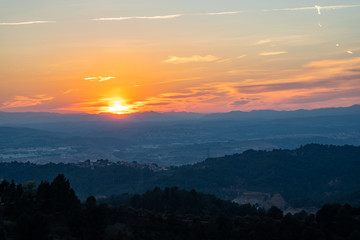 Sunset view on the skyline with mountains and nature