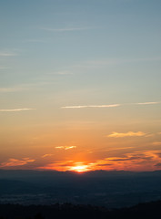 Sunset view on the skyline with mountains and nature