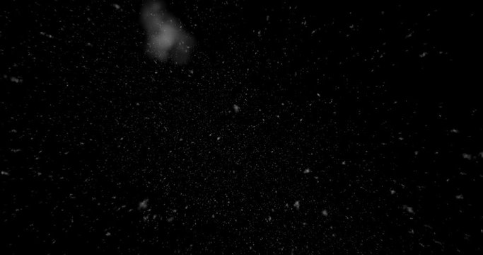 Gently falling snow isolated on black background in 4K 60FPS to be used for composing, motion graphics, or as a background or overlay(Number2)