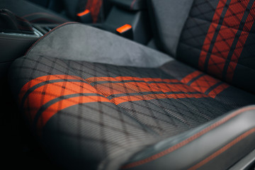 Modern car sport seats with red stripes