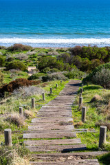 Fototapeta na wymiar The stairs along the Hallett Cove boardwalk around the Sugarloaf rock formation in South Australia on 19th June 2019