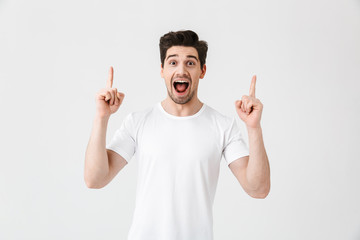 Fototapeta premium Full length portrait of a cheerful young man