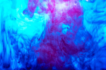Fototapeta na wymiar abstract photo of blue paint in water on white background