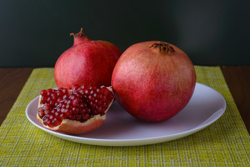 pomegranate on a white dish