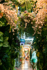 Simulation flowers simulation trees store within the Chatuchak weekend market. Bangkok, Thailand.