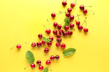 Sweet ripe cherry on color background