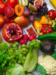 Composition with assorted raw vegetables and fruits