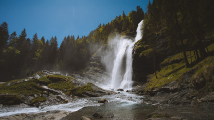 Obraz premium Wild waterfall in summer nature
