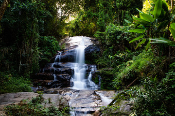 Long exposure of Montha Than waterfall in the jungle of Chiang Mai (Thailand)