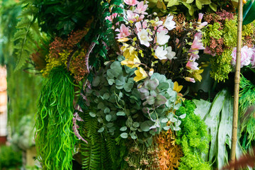 Simulation flowers simulation trees store within the Chatuchak weekend market. Bangkok, Thailand.