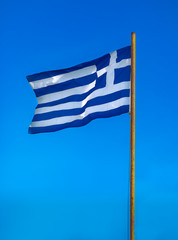 Greek flag waving on clear blue sky