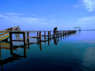 Fototapeta premium Sea with fisherman