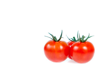 Copy space .Tomatoes isolated on white