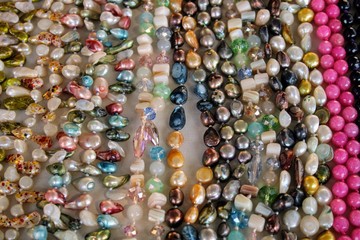 Necklaces of gems of different colors