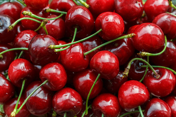 ripe red sweet cherry, top view background. tasty and sweet organic farm cherries. GMO and pesticides free berries background