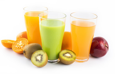 Juices of apple, kiwi orange in a glass.