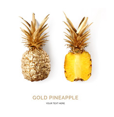 Creative layout made of gold pineapple.  Tropical flat lay. Food concept.
