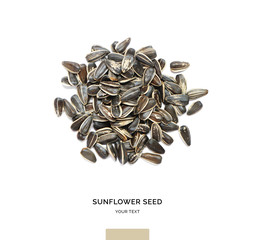 Creative layout made of sunflower seeds on white background.Flat lay. Food concept.