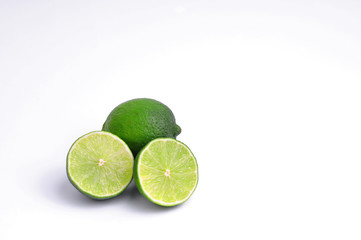 Lime lemons group on white background.