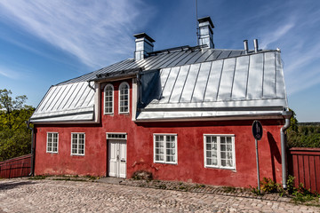 old house with red roof