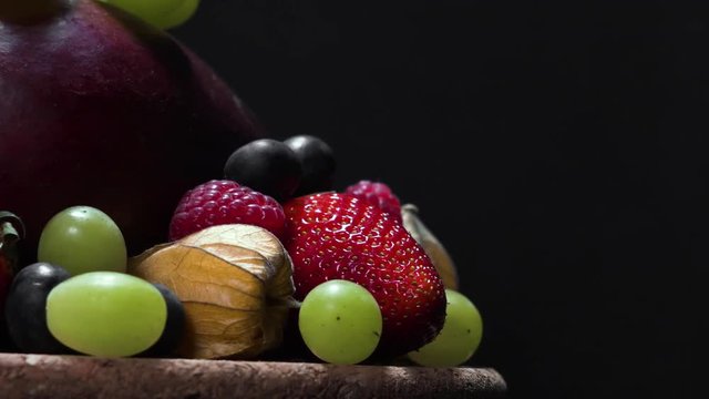 Fresh fruit mix on rotating corc plate. Still detail shot.