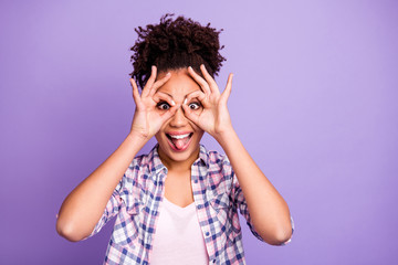 Close-up portrait of her she nice attractive lovely cheerful cheery optimistic wavy-haired girl in checked shirt showing ok-sign on eyes mood isolated over violet purple pastel background