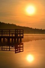 Naklejka na ściany i meble sunset on lake
