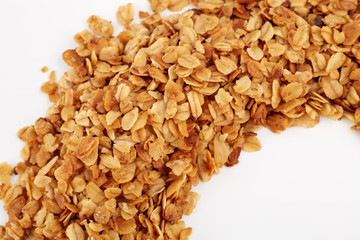 Organic homemade Granola Cereal with oats and almond. Texture oatmeal granola or muesli as background. Food concept. Healthy and wholesome food.