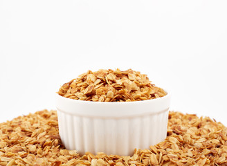Organic homemade Granola Cereal with oats and almond. Texture oatmeal granola or muesli as background. Food concept. Healthy and wholesome food.