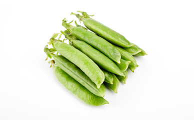 Fresh green pea pod with beans isolated on white background.