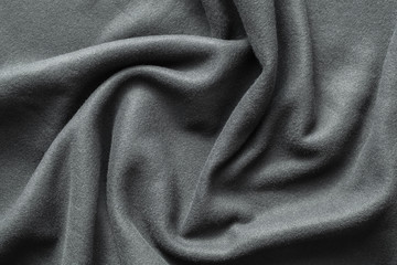 Background texture of dark gray fleece