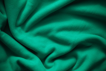 Background texture of green fleece © evannovostro