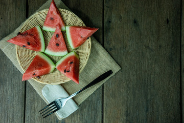Red Watermelon on wooden table background