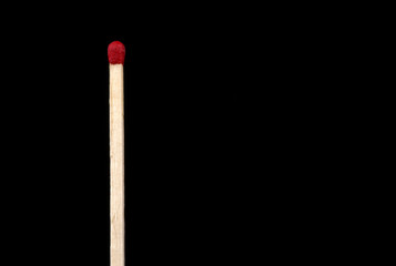 Large Matchstick Isolated on a Black Background