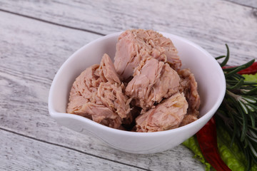 Tasty canned tuna fish in the bowl