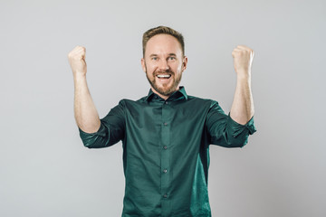 Fototapeta premium Happy successful screaming with winning expression