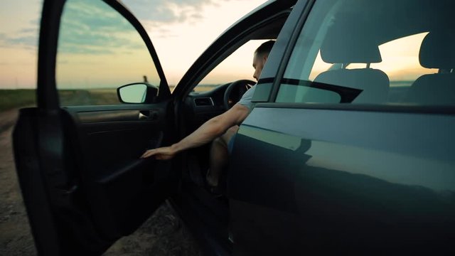 Man Driver Exit From His Car In Field