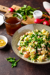 Cold Soup Okroshka with sausage, vegetables and kvass